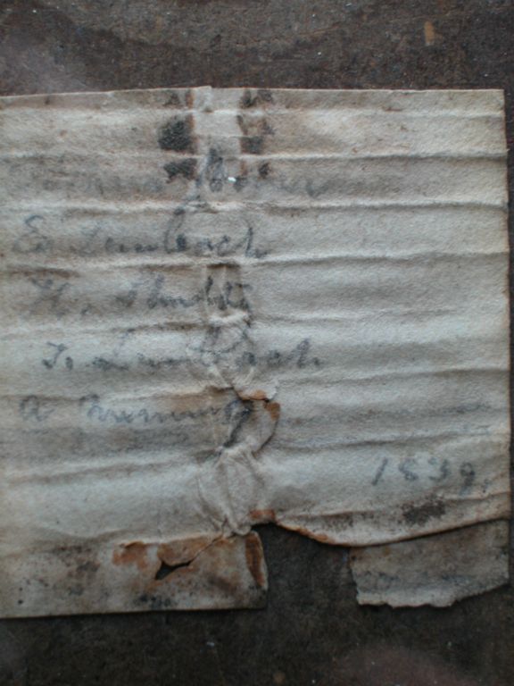 During the restoration, this piece of paper was found stuffed inside of the keyboard cover lock, dated 1839. After some research, the peope listed are believed to have been bellows pumpers.