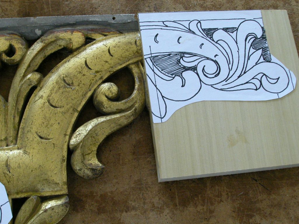 Two of the three shades had had pieces cut off at some point. Here is a new piece glued on, ready to carve