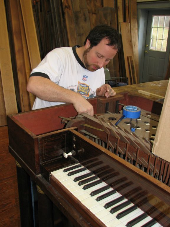 Chris Bono disassembling the organ