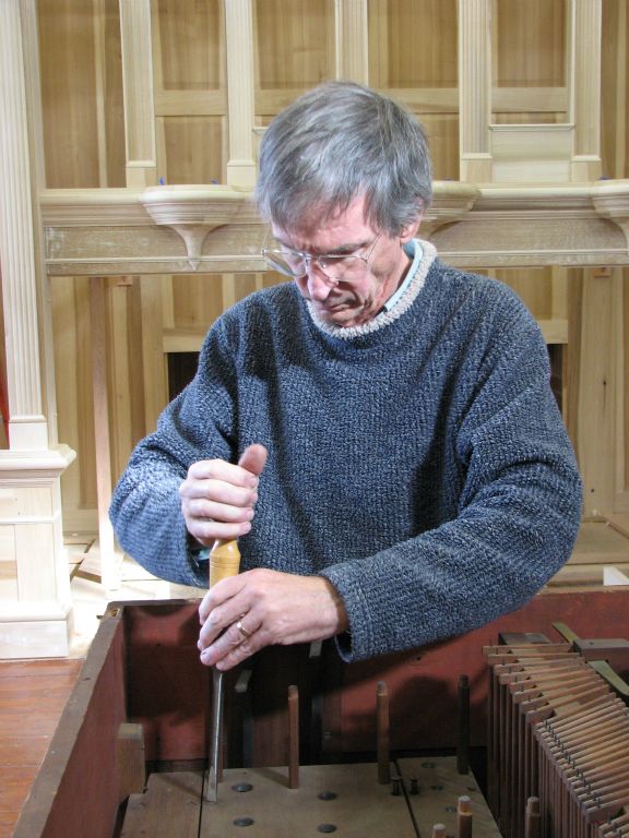 George Taylor disassembling the organ