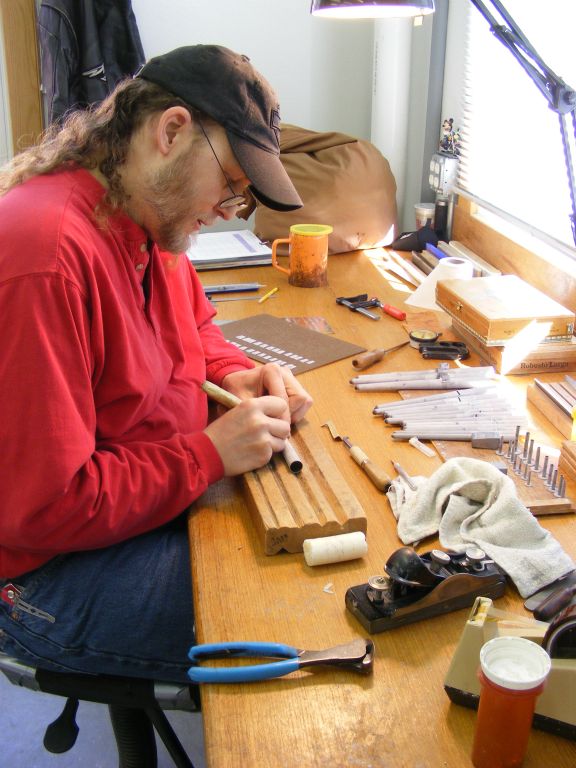 Jeff Peterson making some new pipes to replace some of the missing ones.